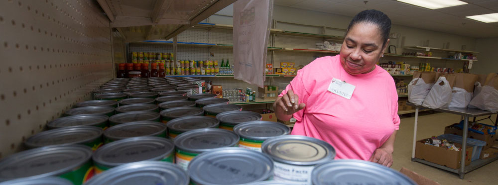 woman volunteer in food pantry