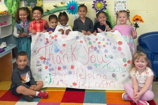 children-with-sign-thanking-teachers