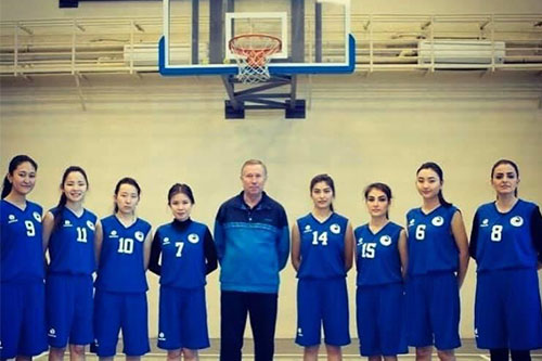 Zarlasht playing with her teammates on the women's basketball team at American University of Central Asia