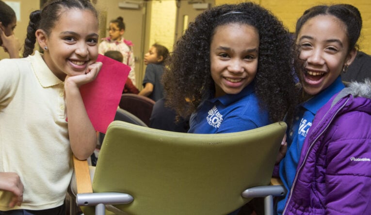 three girls smiling